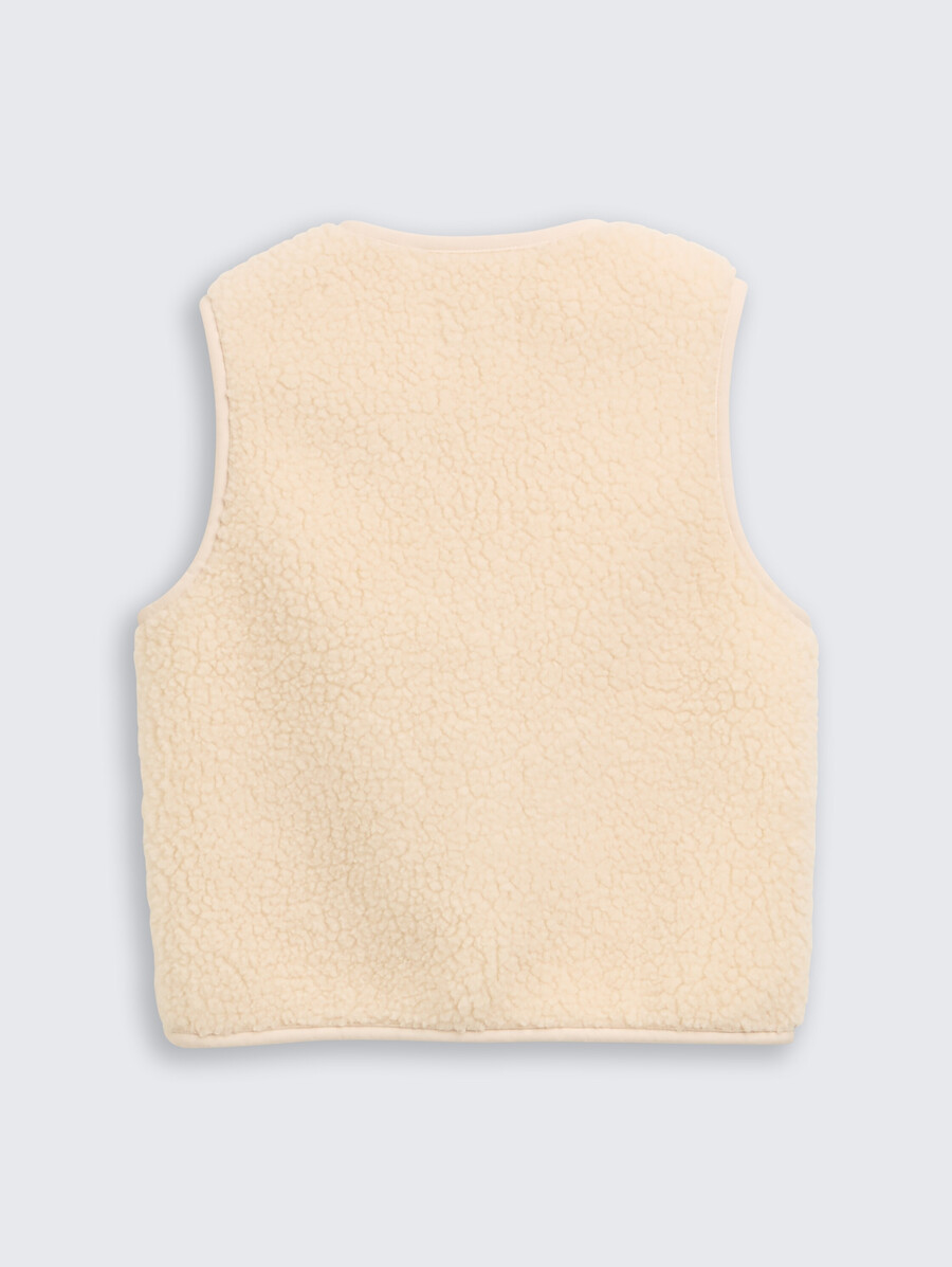 chaleco de peluche con bolsillos de corazón y forro polar.