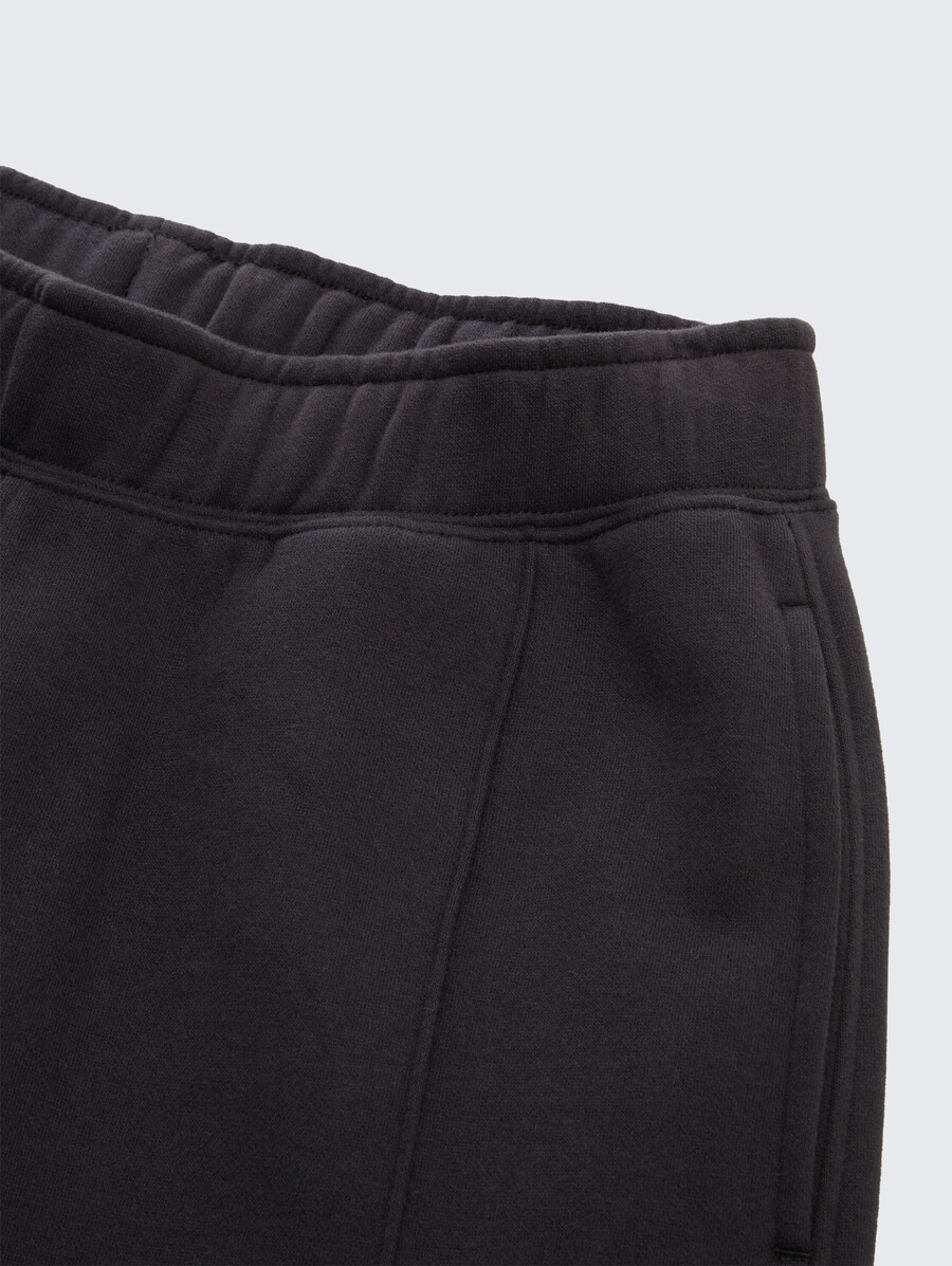pantalones de jogging con pliegues decorativos