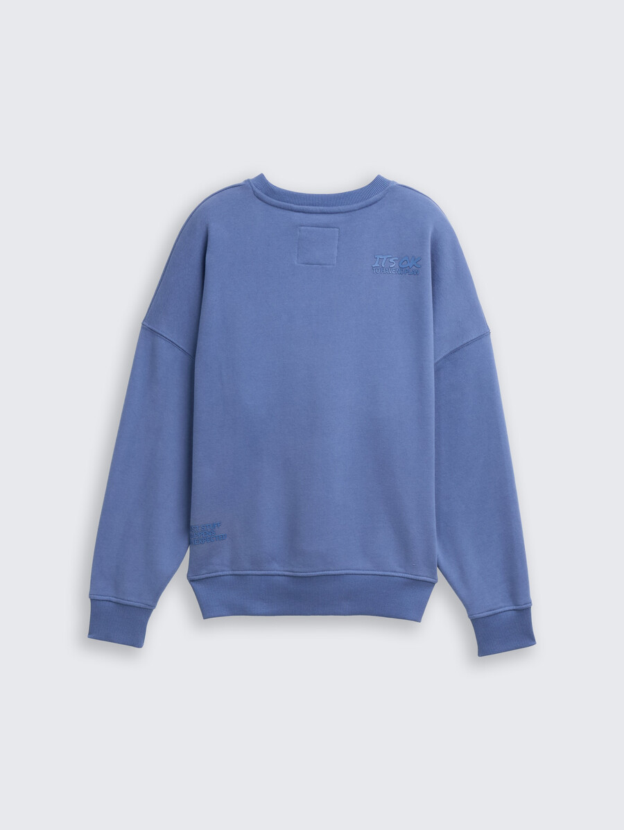 sudadera oversize con estampado en la espalda