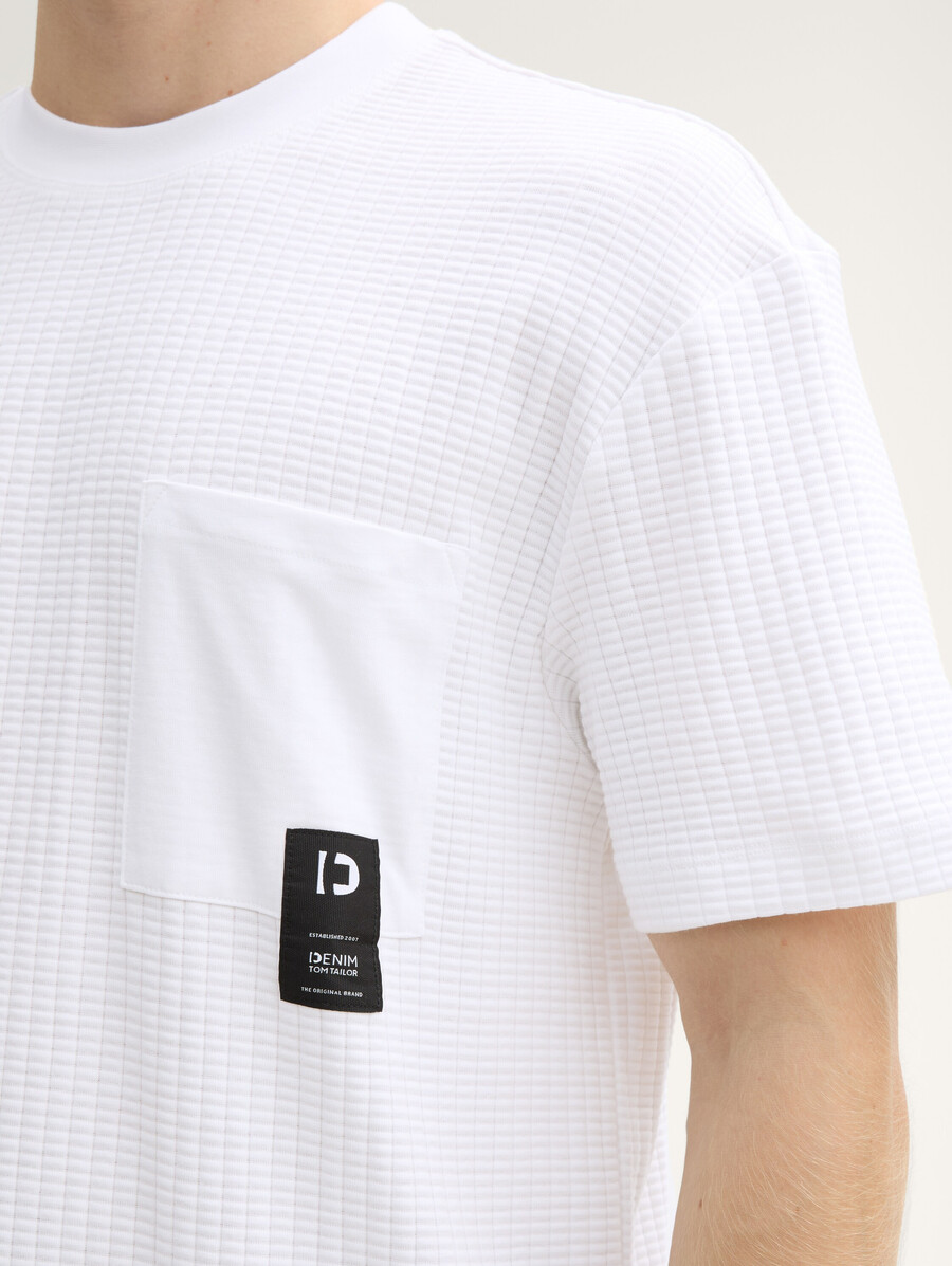 camiseta de corte relajado con bolsillo en el pecho