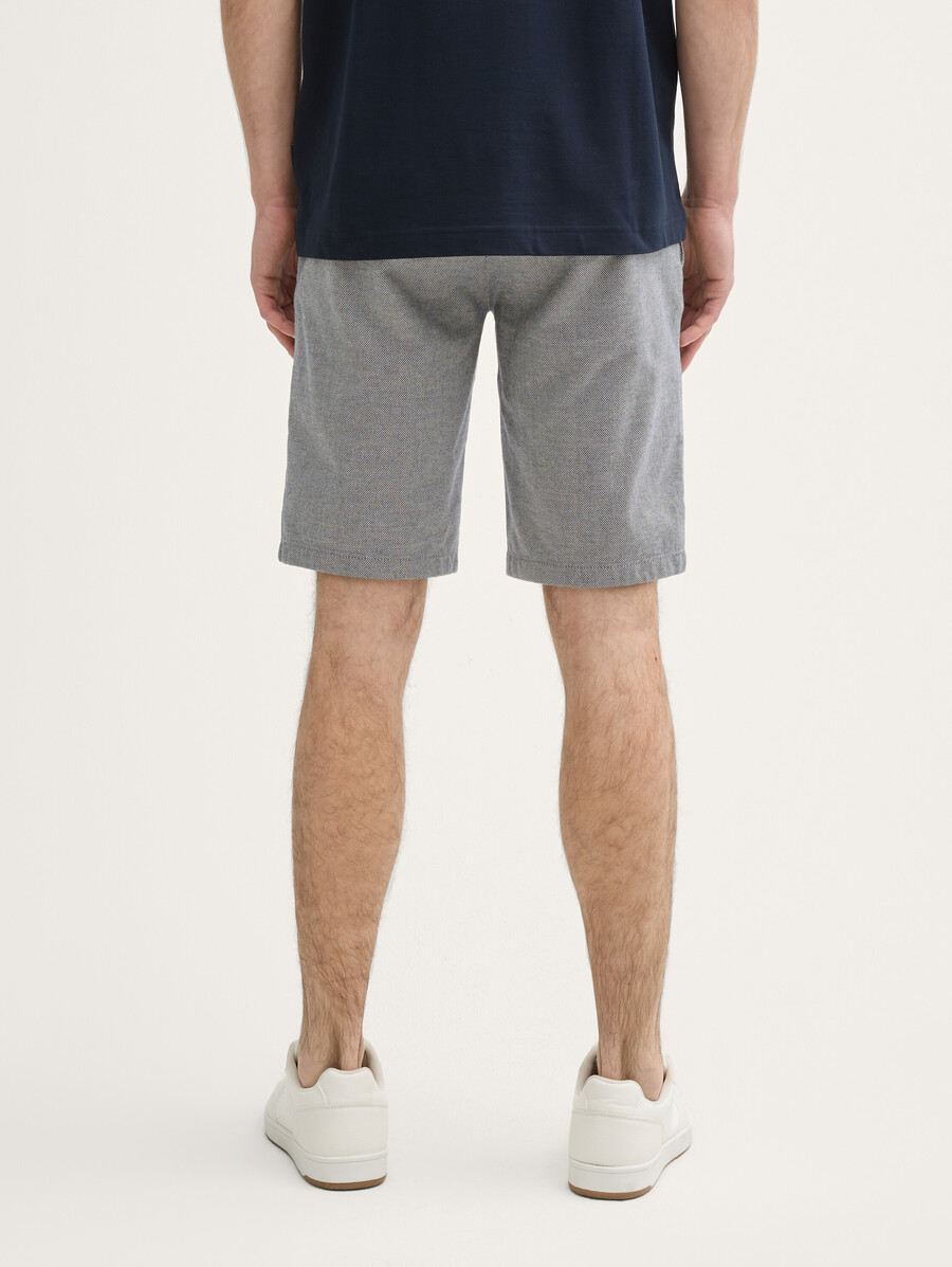 pantalones cortos chinos ajustados y elásticos con cinturón