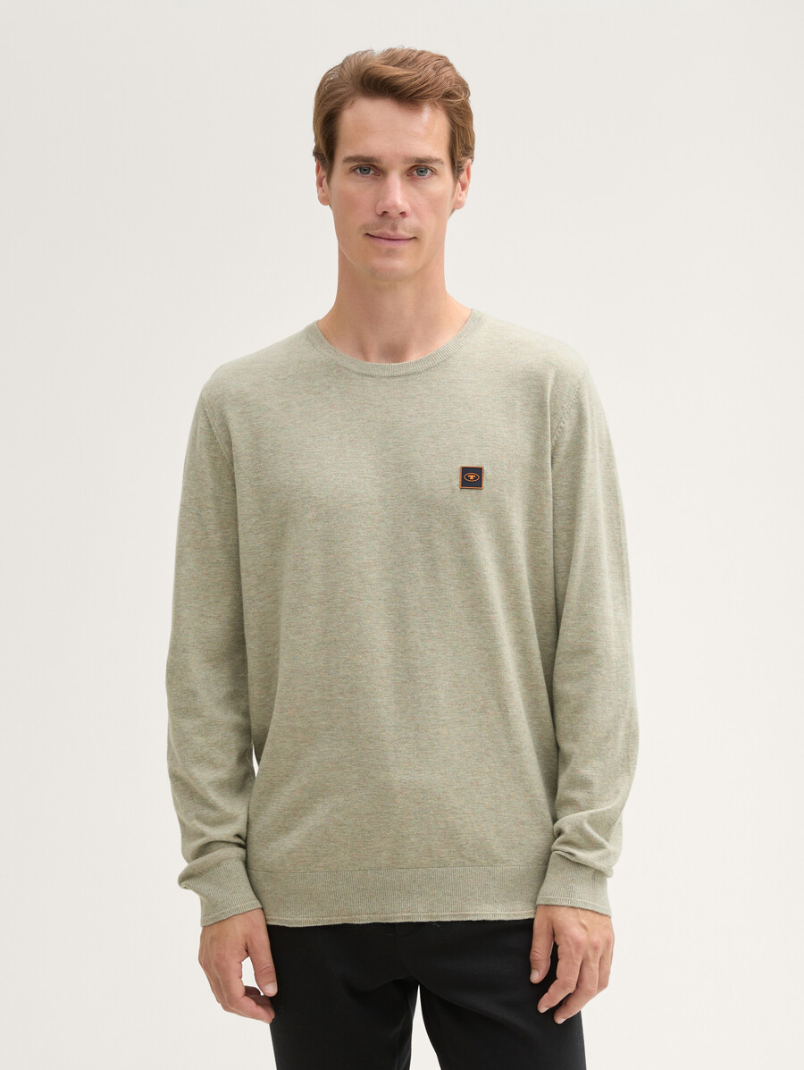 jersey de punto con insignia de logotipo