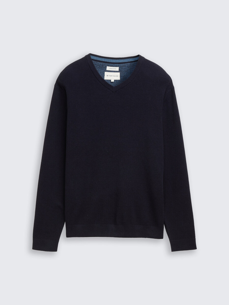 jersey de punto con cuello de pico de algodón orgánico.