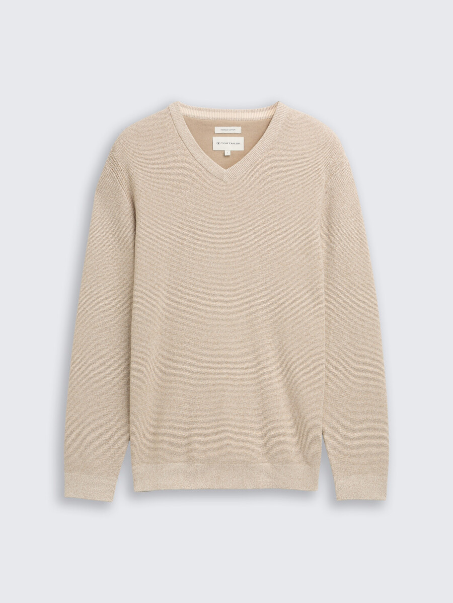 jersey de punto con cuello de pico de algodón orgánico.