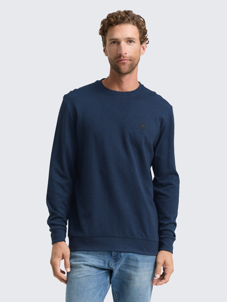 camisa de manga larga con insignia del logotipo
