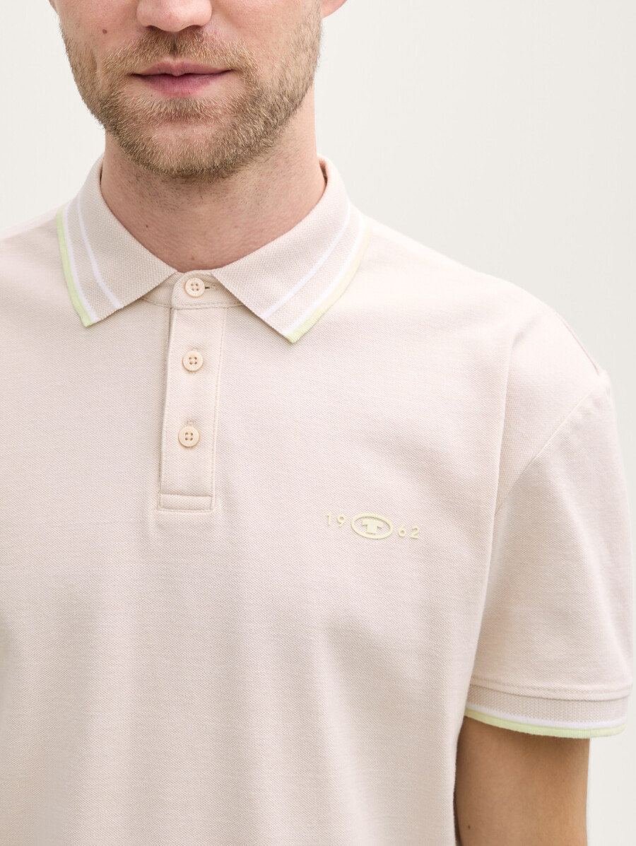polo de piqué con elástico