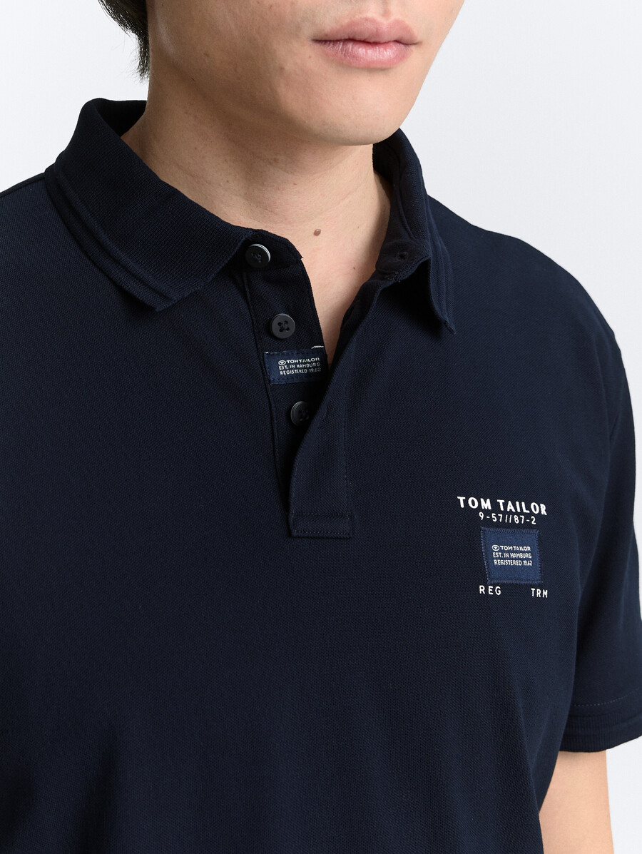 polo de piqué con elástico