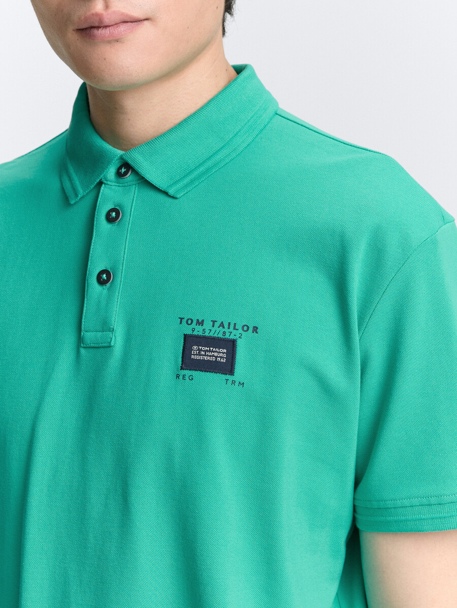 polo de piqué con elástico