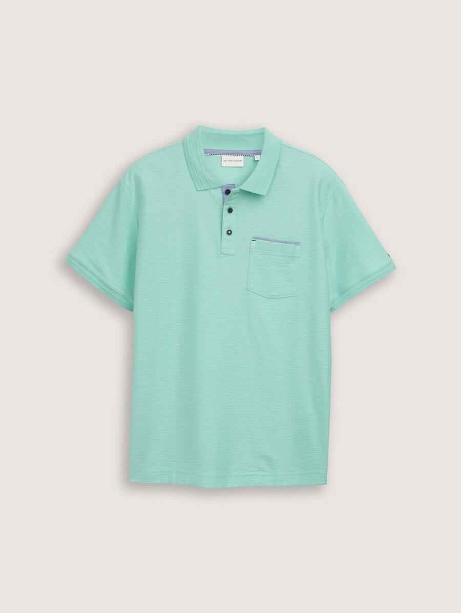 camisa polo con bolsillo en el pecho