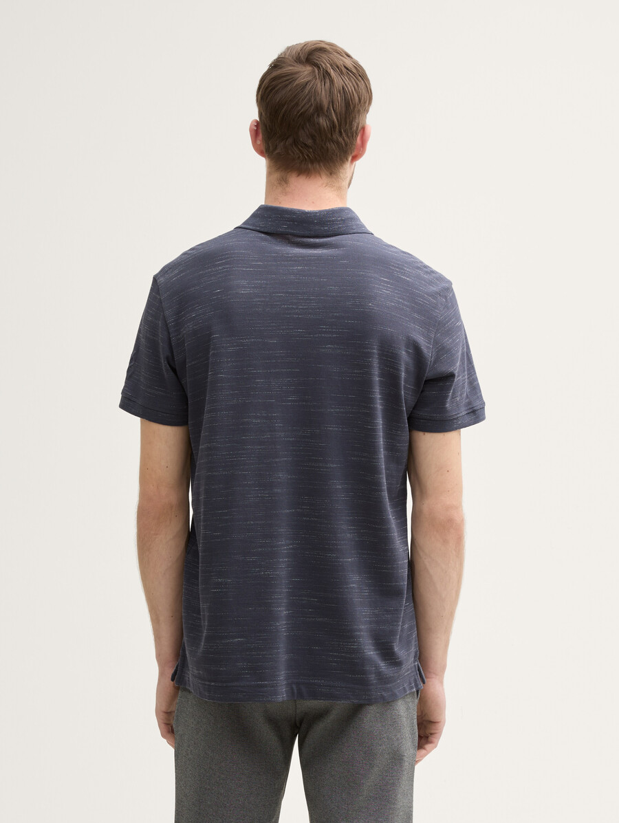 camisa polo con bolsillo en el pecho
