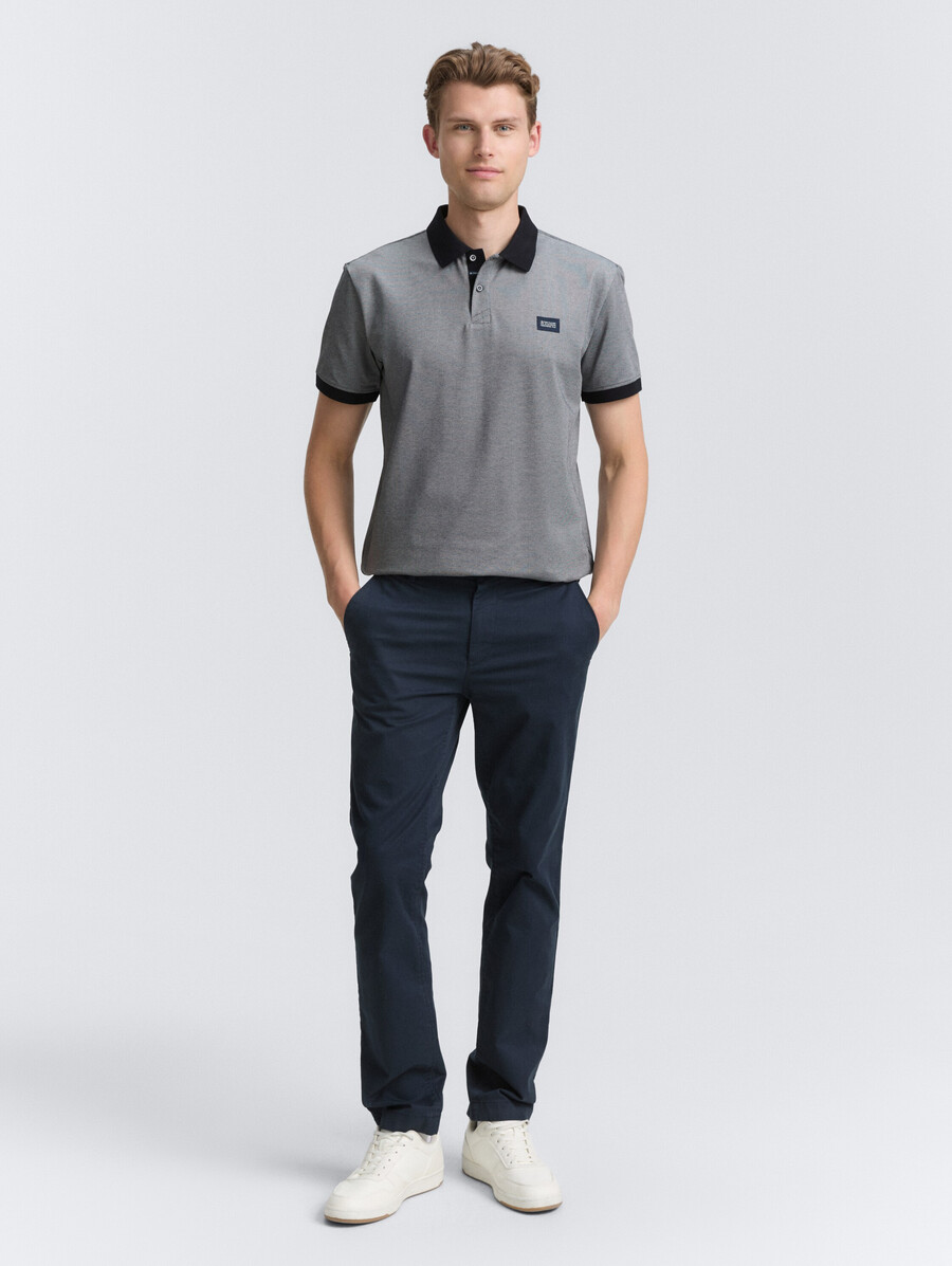 polo de piqué con elástico