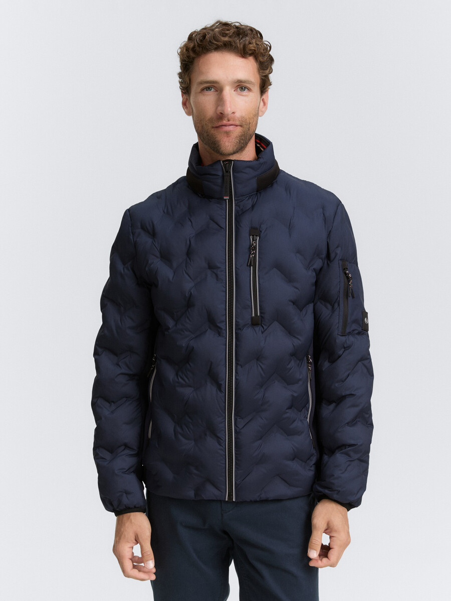 chaqueta acolchada híbrida con capucha plegable
