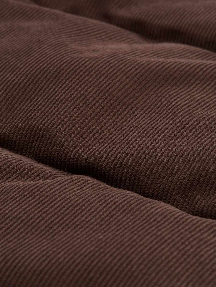 chaqueta acolchada de pana con capucha desmontable