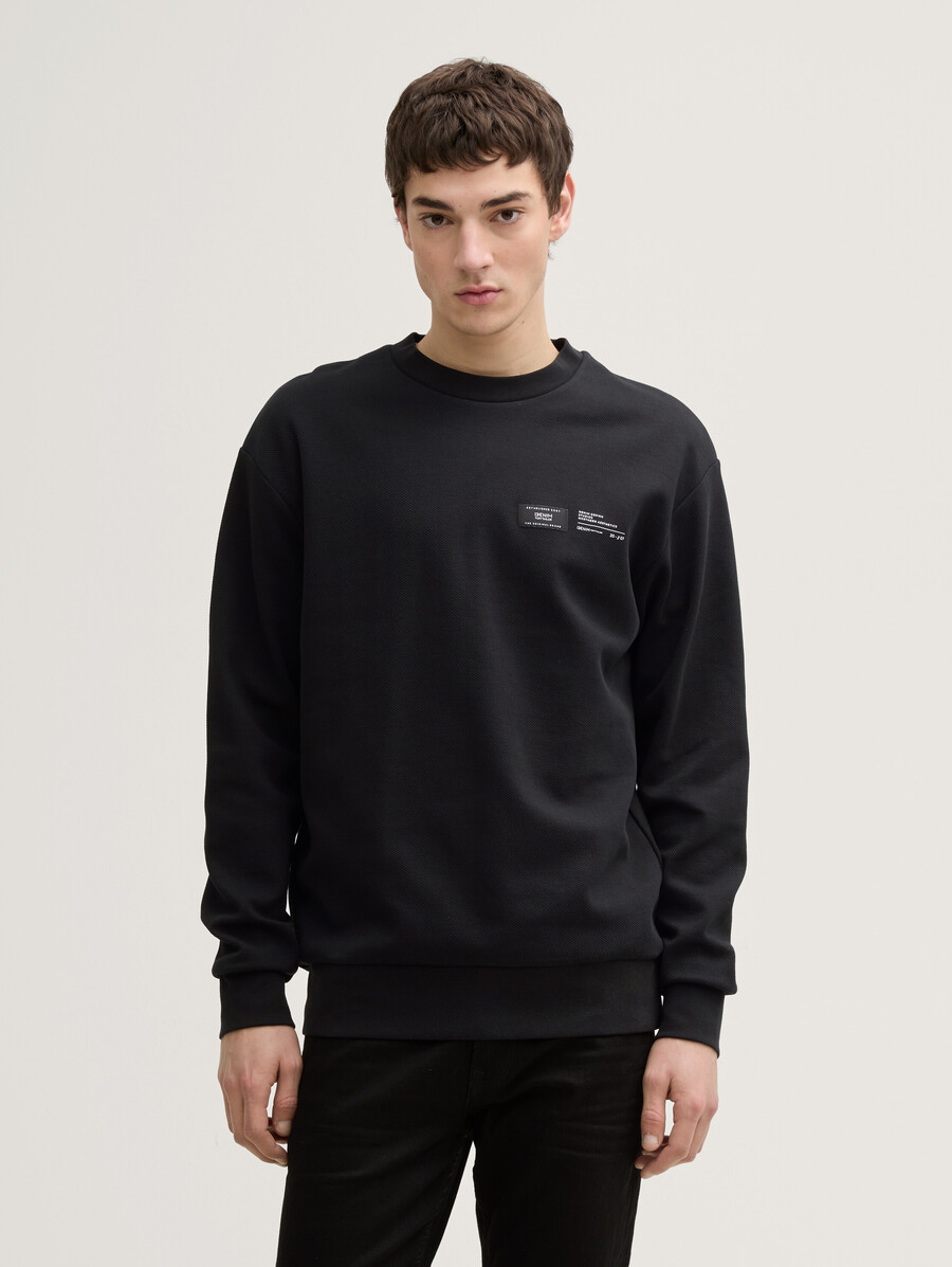 sudadera con etiqueta de logo