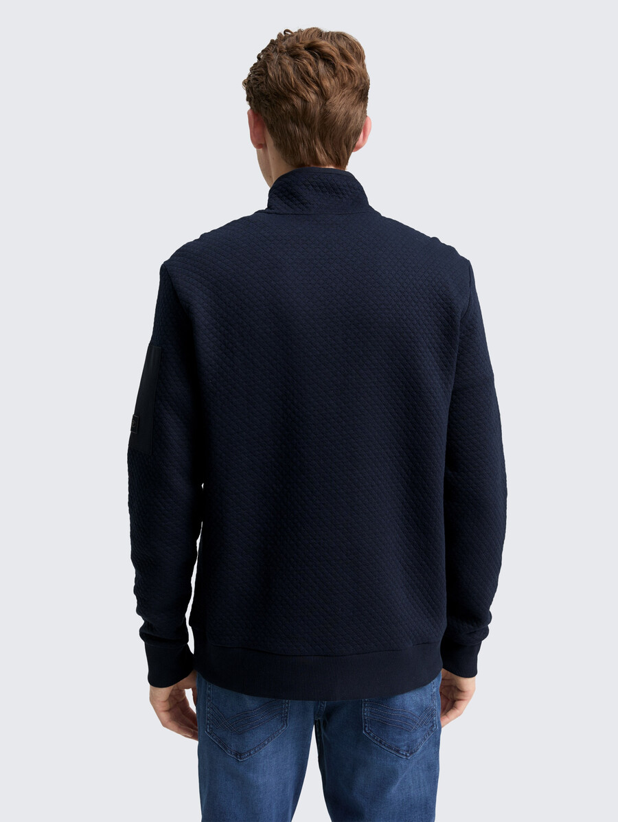 sudadera troyer con bolsillo en la manga