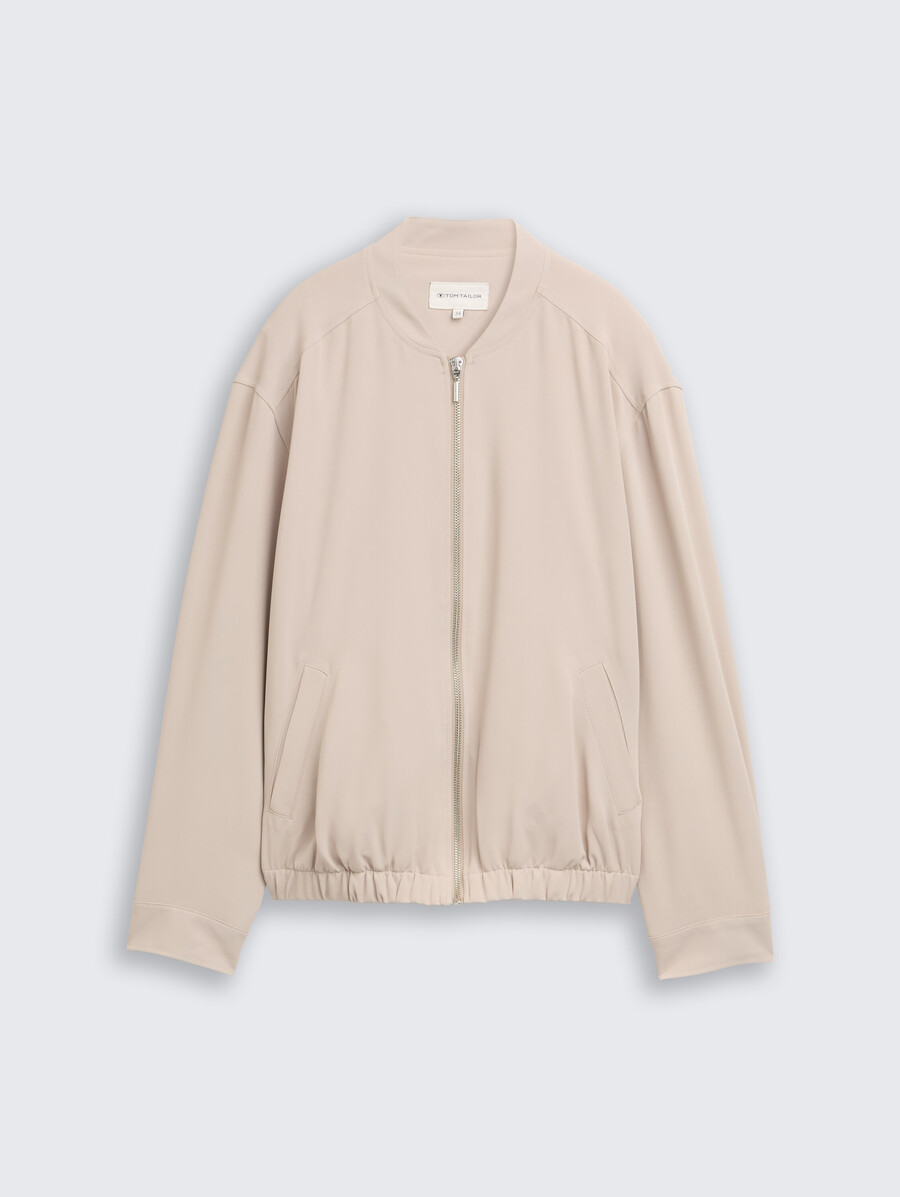 chaqueta tipo blusón de corte holgado