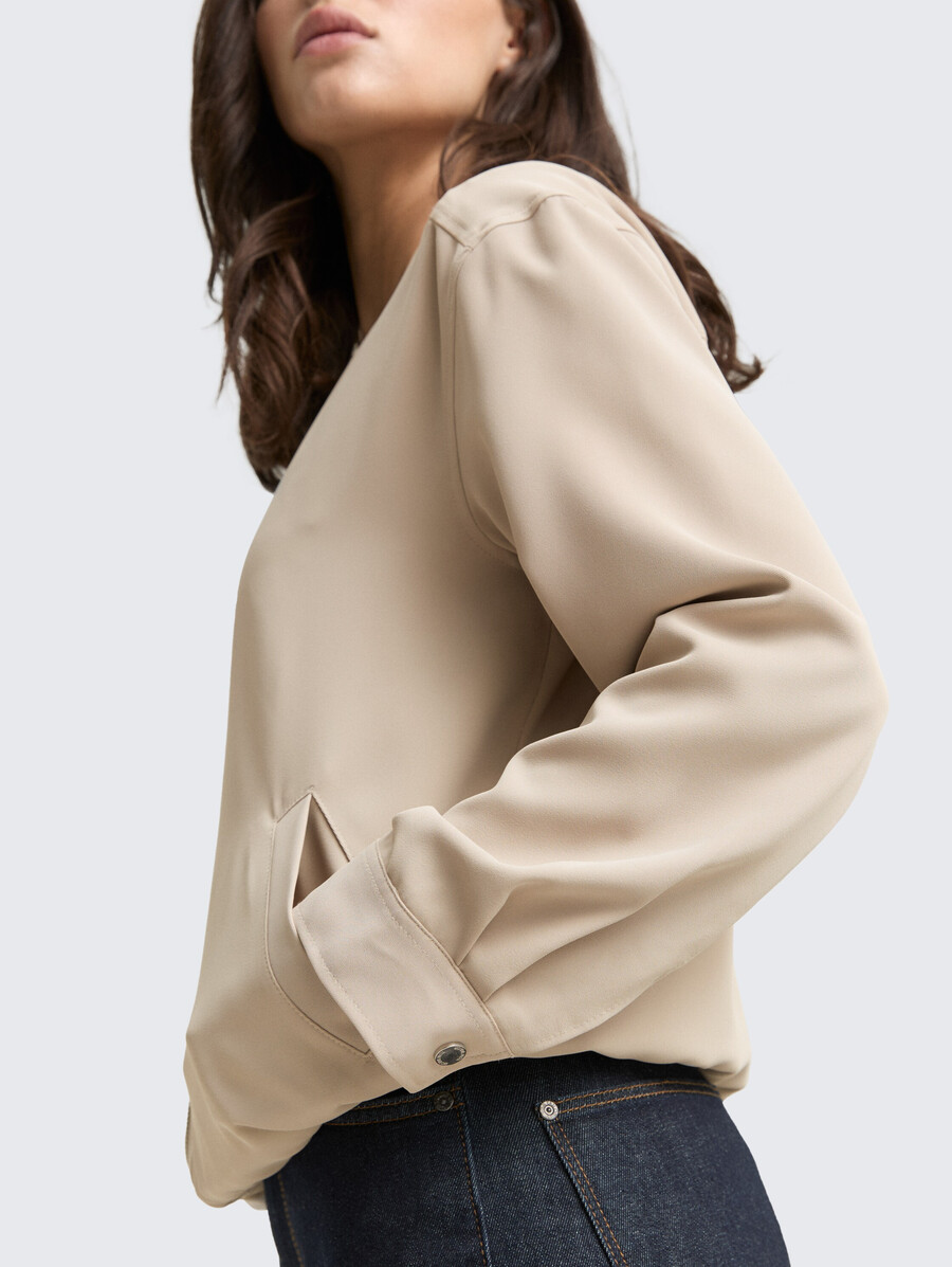 chaqueta tipo blusón de corte holgado