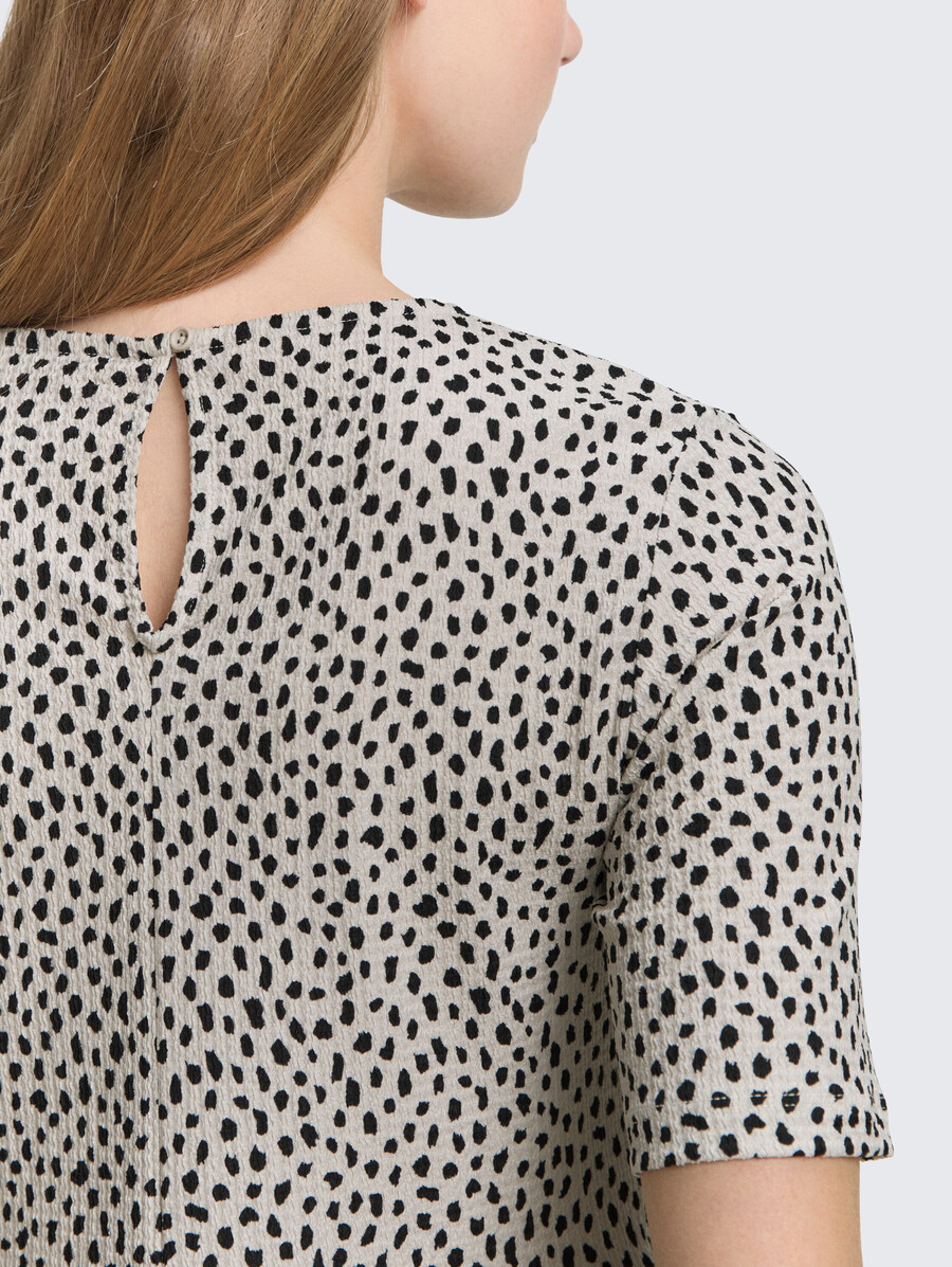 camiseta jacquard con peplum