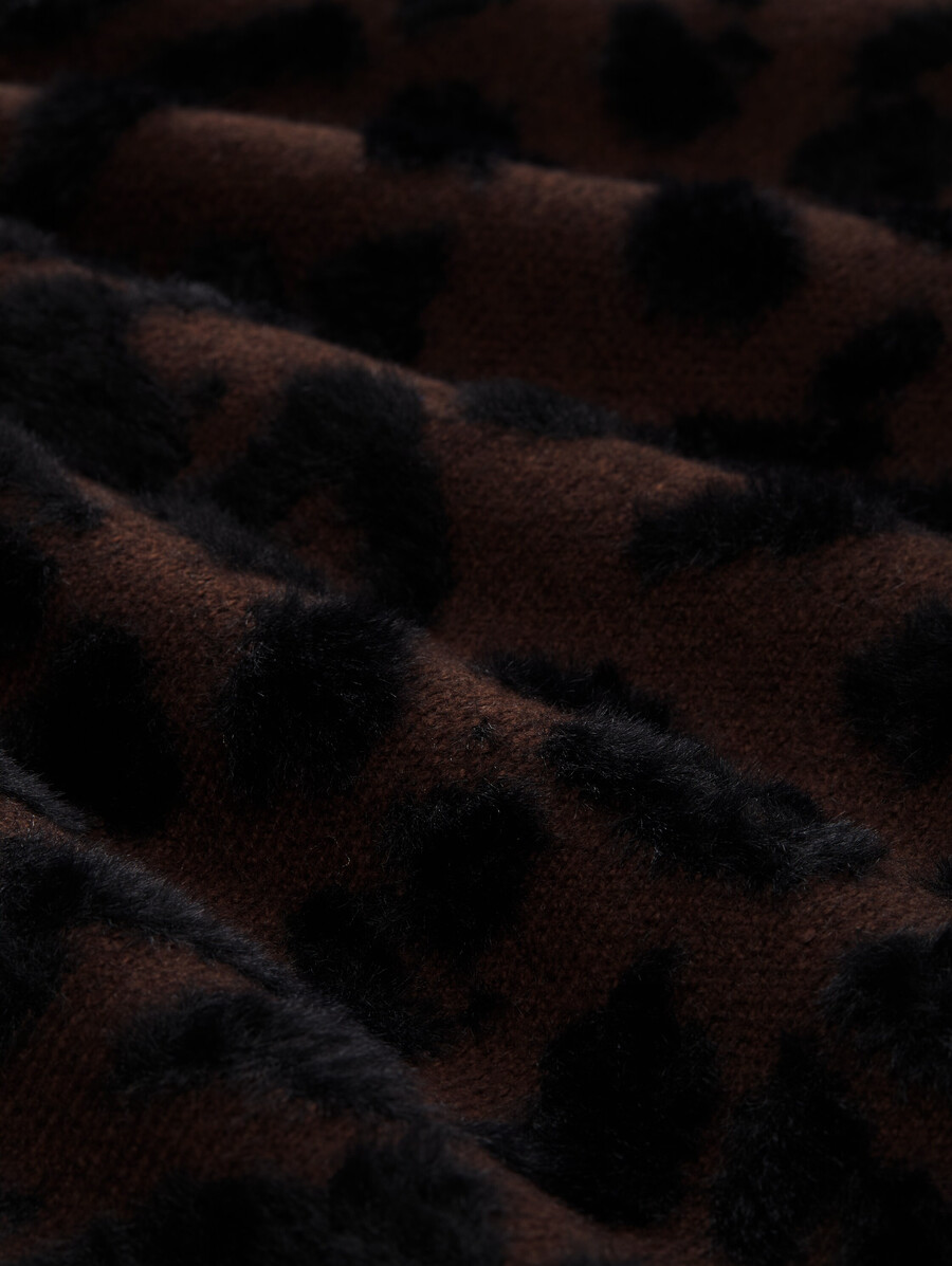 jersey de punto oversize con estampado de leopardo