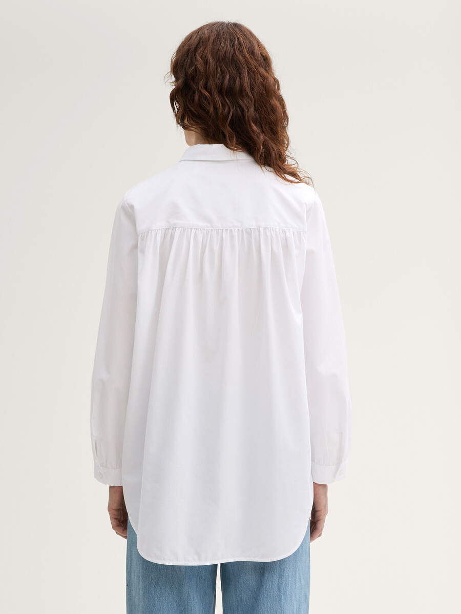 blusa holgada tipo camisa