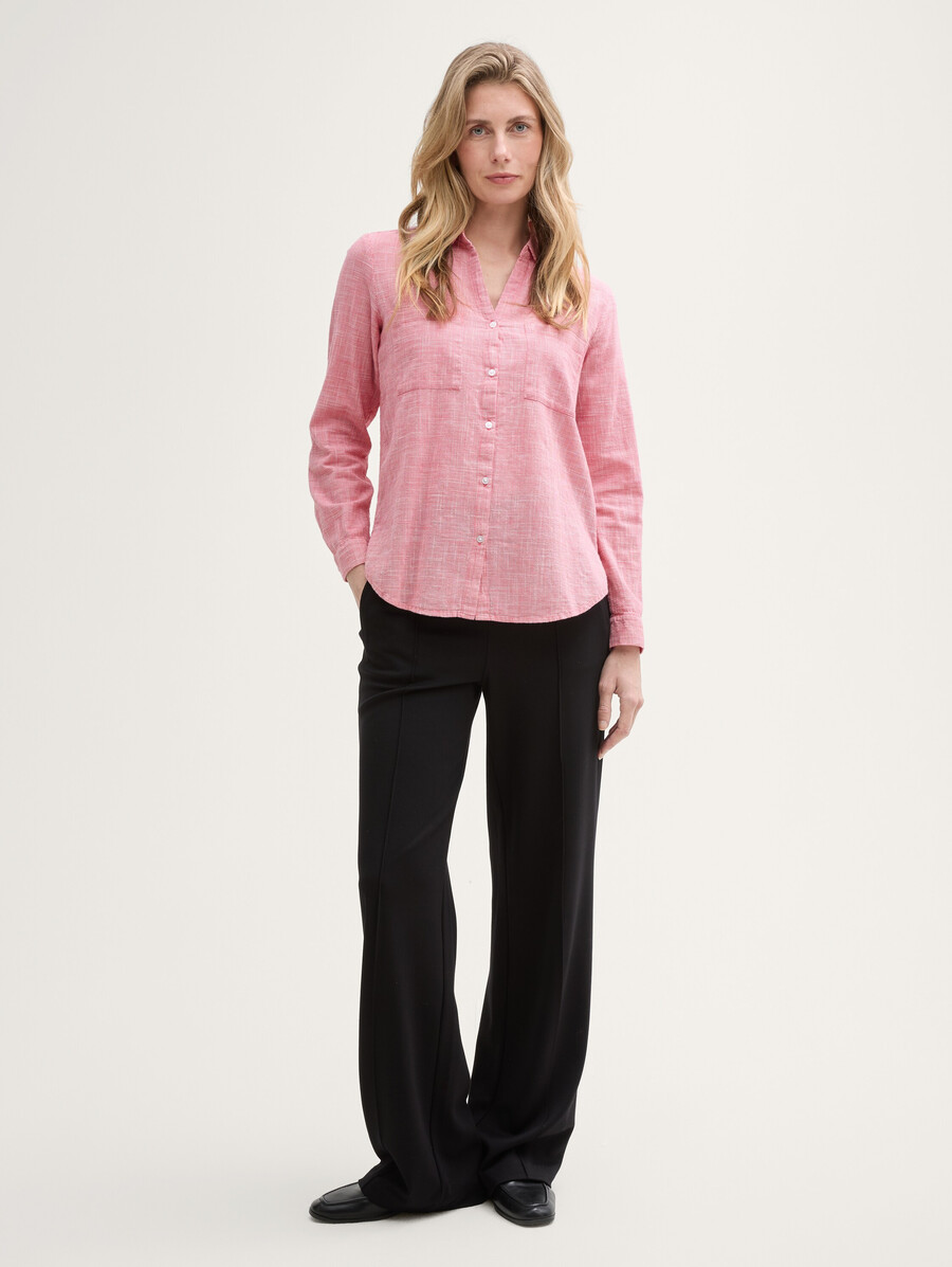 blusa con bolsillos en el pecho