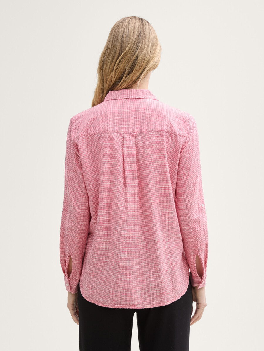 blusa con bolsillos en el pecho