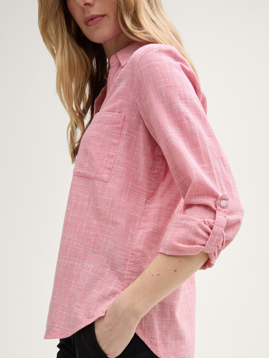 blusa con bolsillos en el pecho