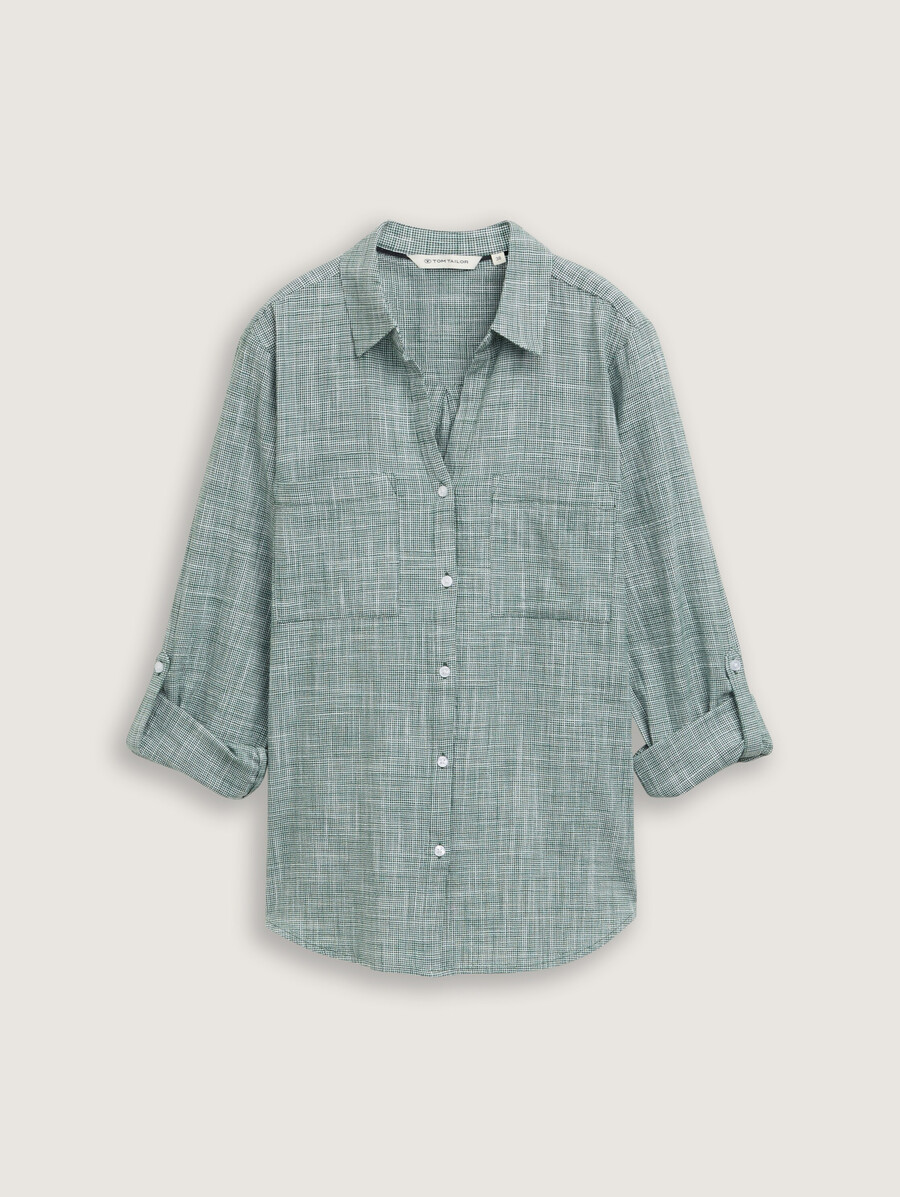 blusa con bolsillos en el pecho