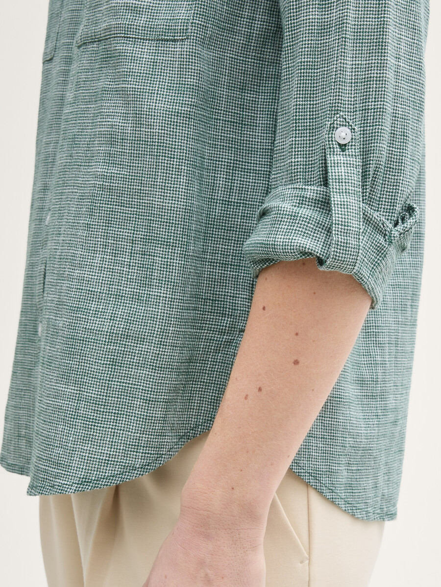 blusa con bolsillos en el pecho