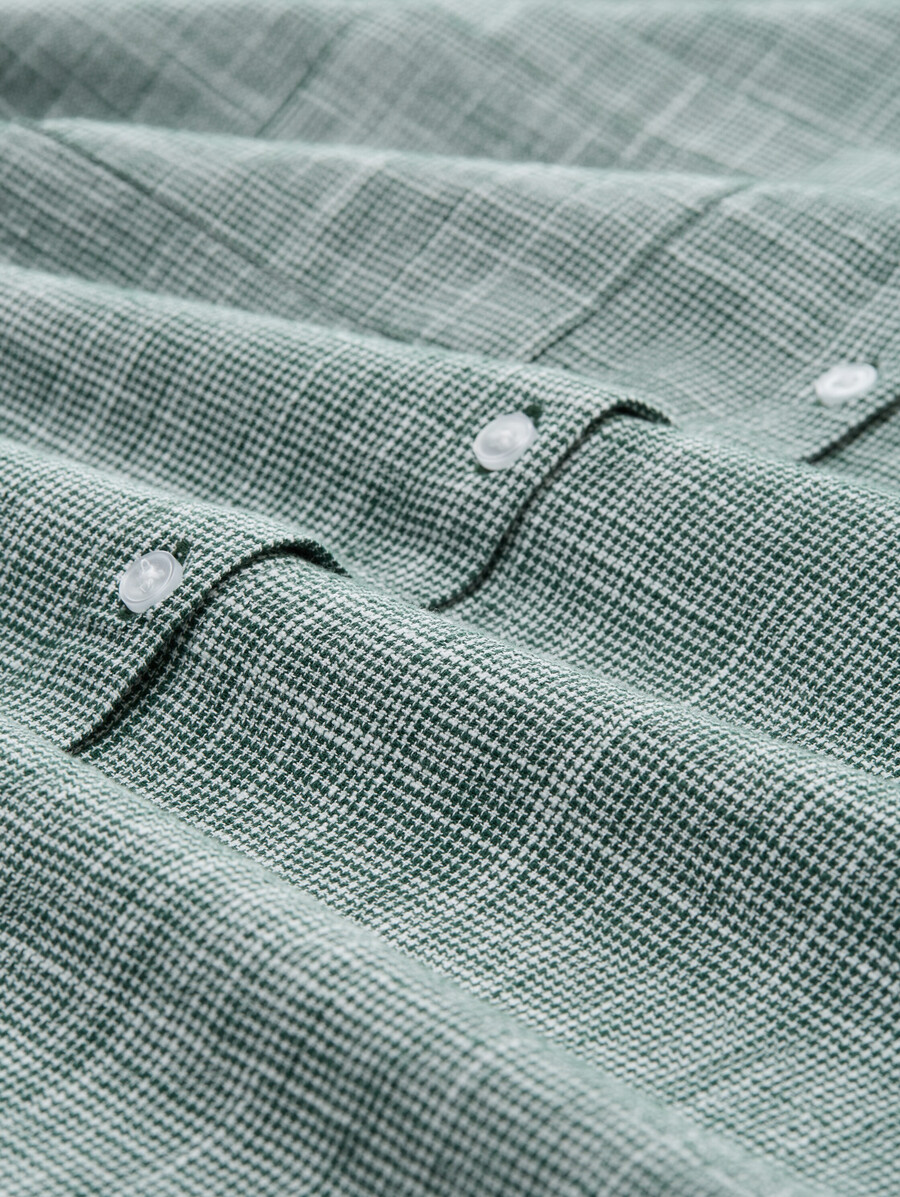 blusa con bolsillos en el pecho