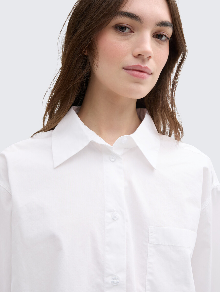 blusa camisera oversize con bolsillo en el pecho