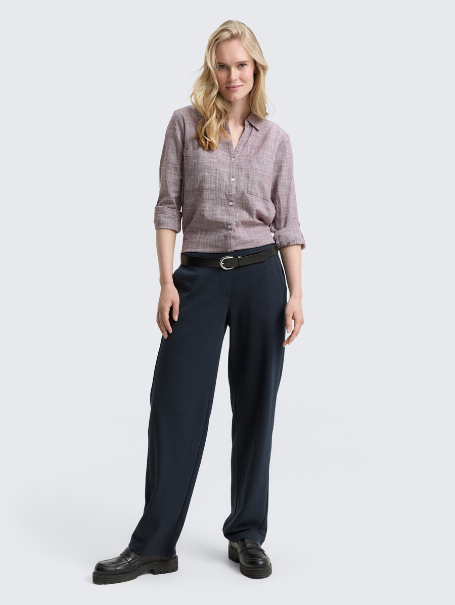 blusa con bolsillos en el pecho
