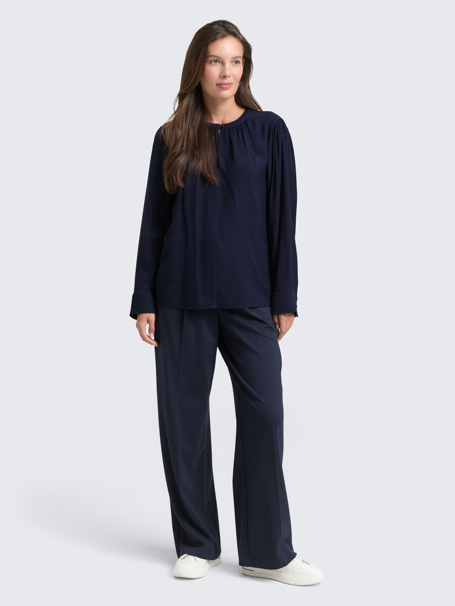 blusa arrugada con volantes