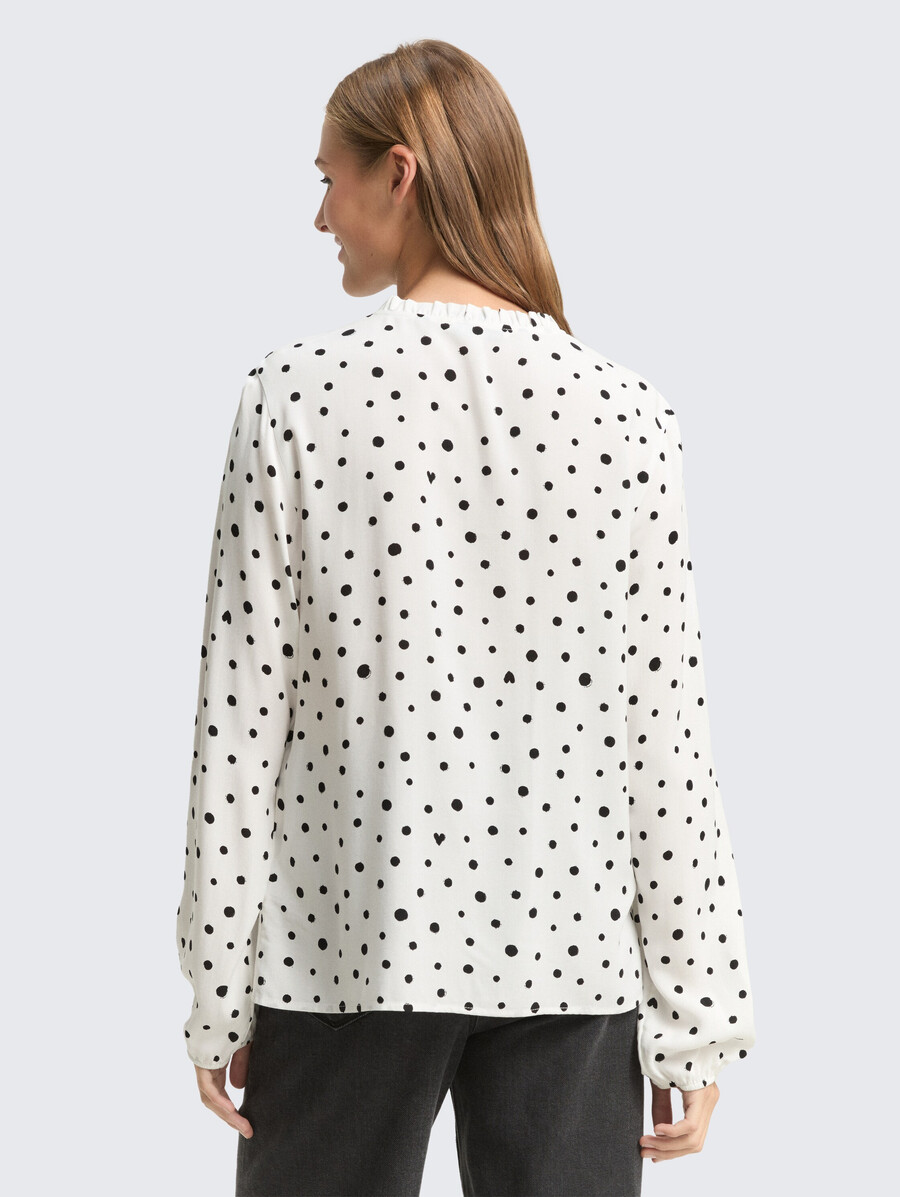 blusa con estampado de lunares