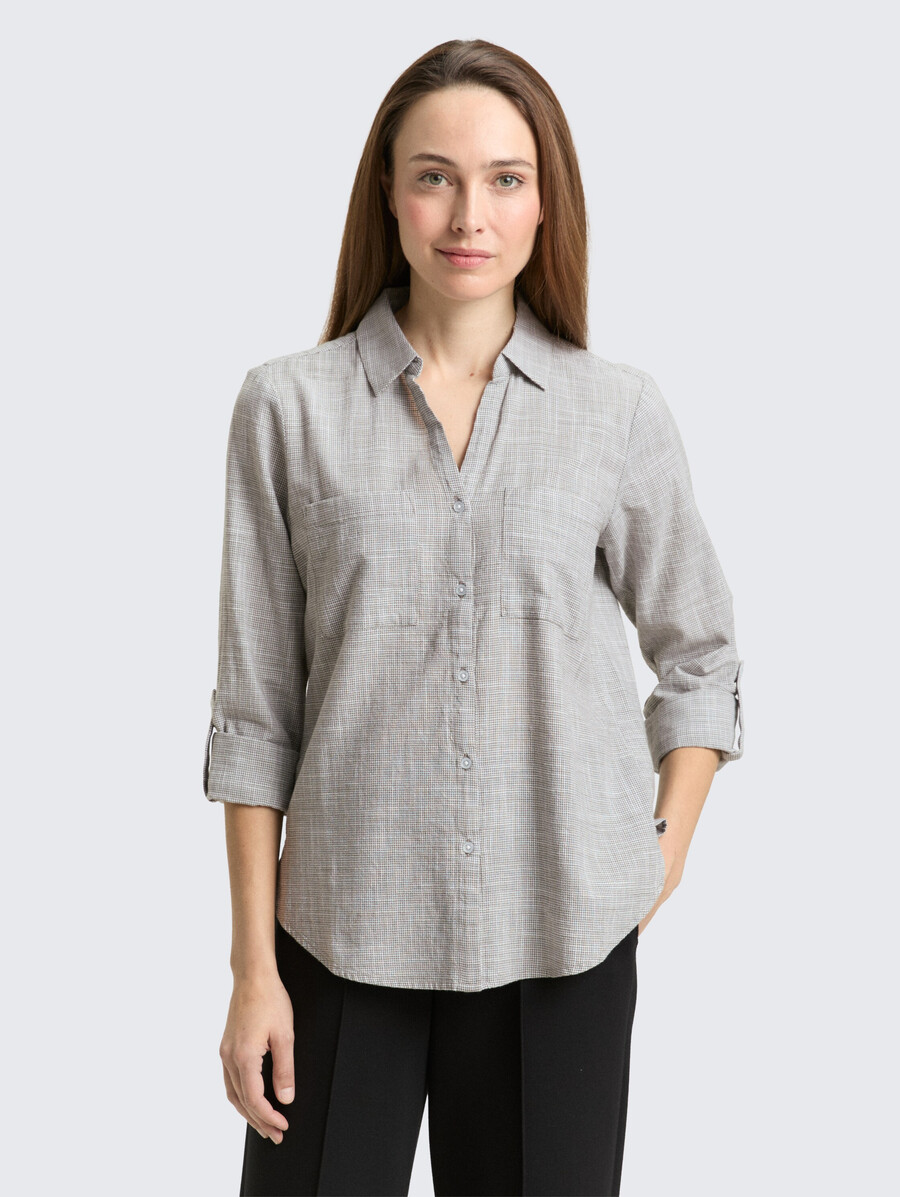 blusa con bolsillos en el pecho