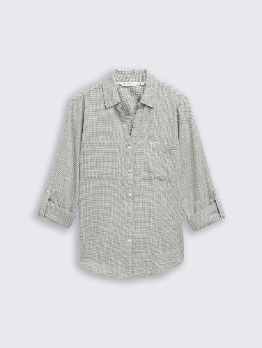 blusa con bolsillos en el pecho