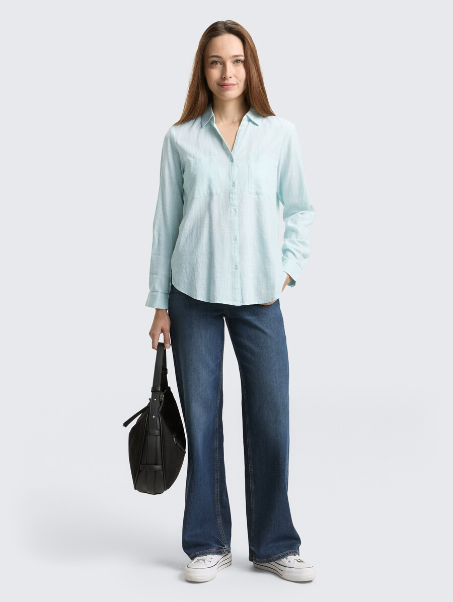 blusa con bolsillos en el pecho
