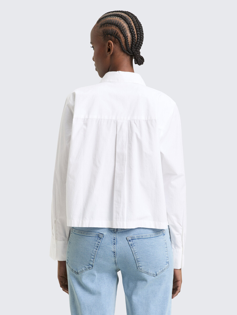 blusa de algodón de corte cuadrado