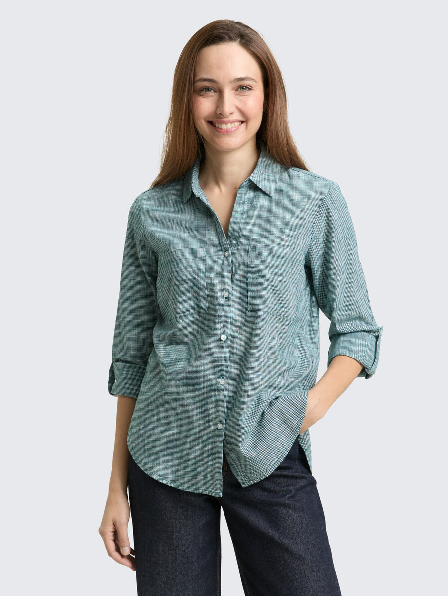 blusa con bolsillos en el pecho