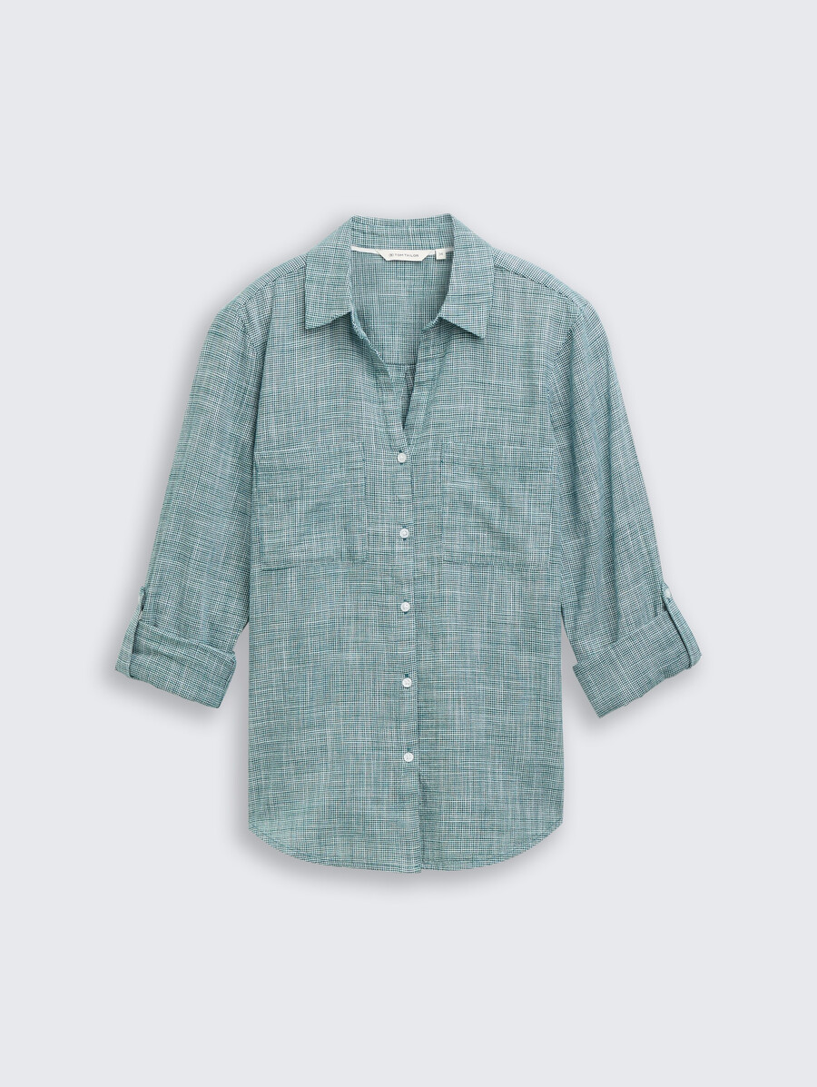 blusa con bolsillos en el pecho