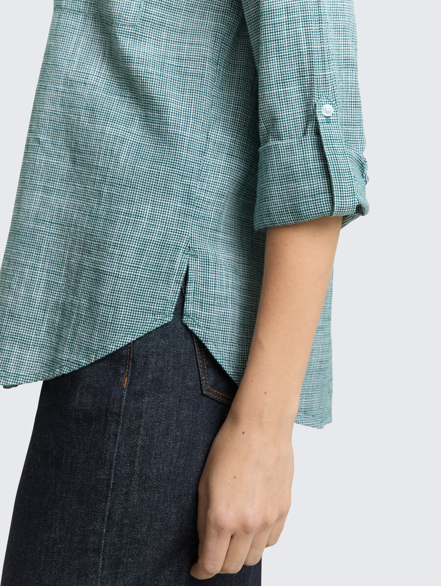 blusa con bolsillos en el pecho