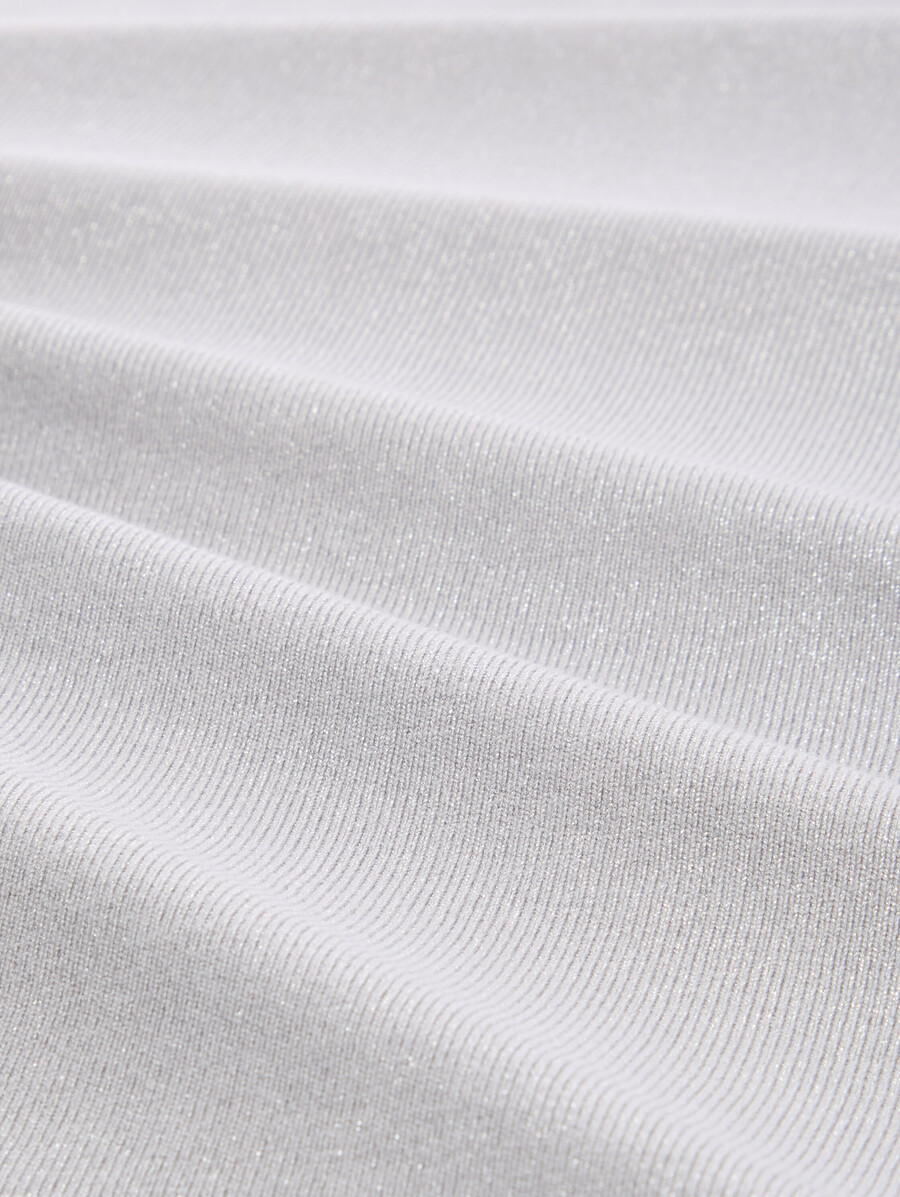 talla grande camisa holgada de manga larga con sutil efecto brillo.