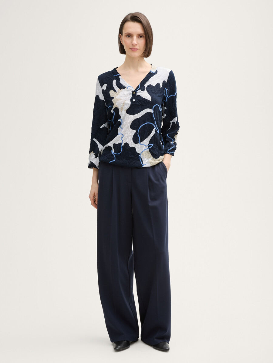 camisa blusa arrugada