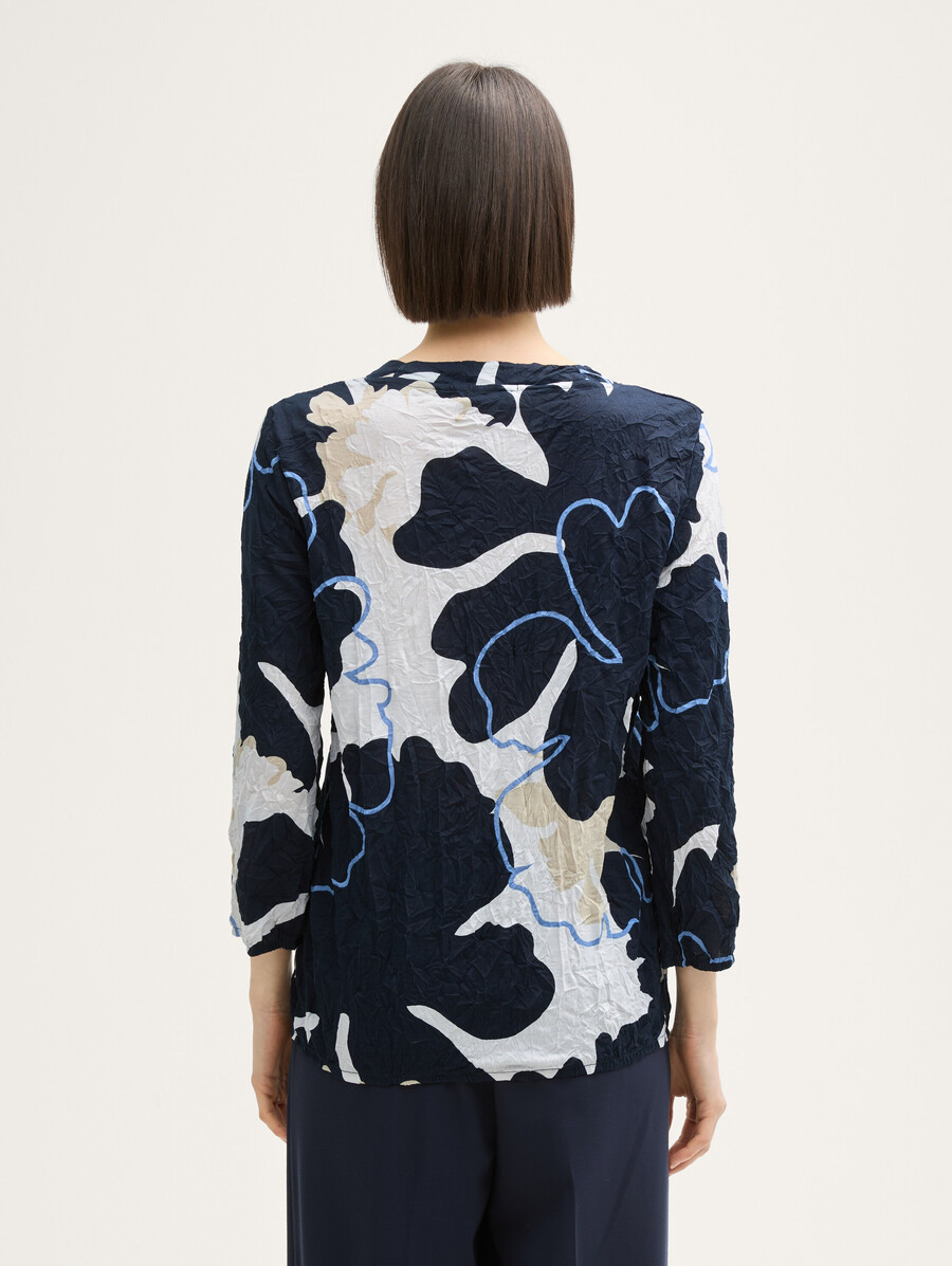 camisa blusa arrugada