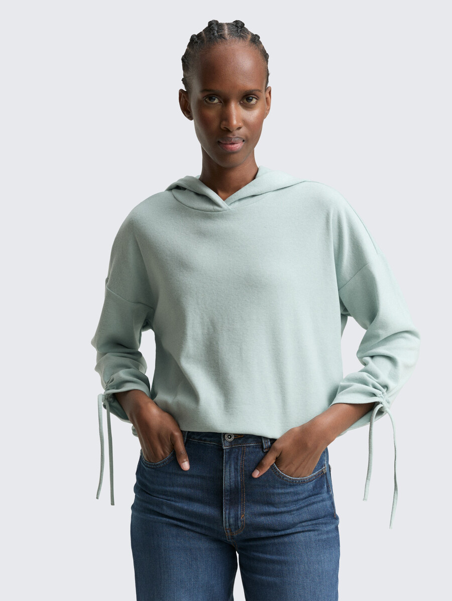 camisa holgada de manga larga con capucha