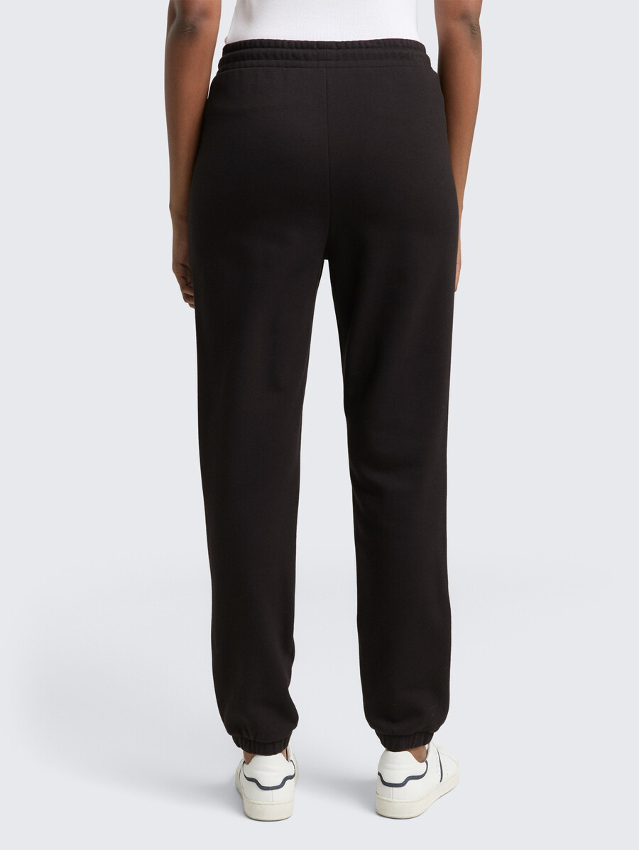 pantalón de jogging con bordado de purpurina