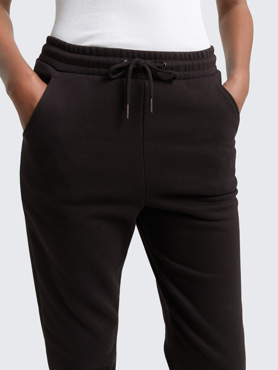 pantalón de jogging con bordado de purpurina