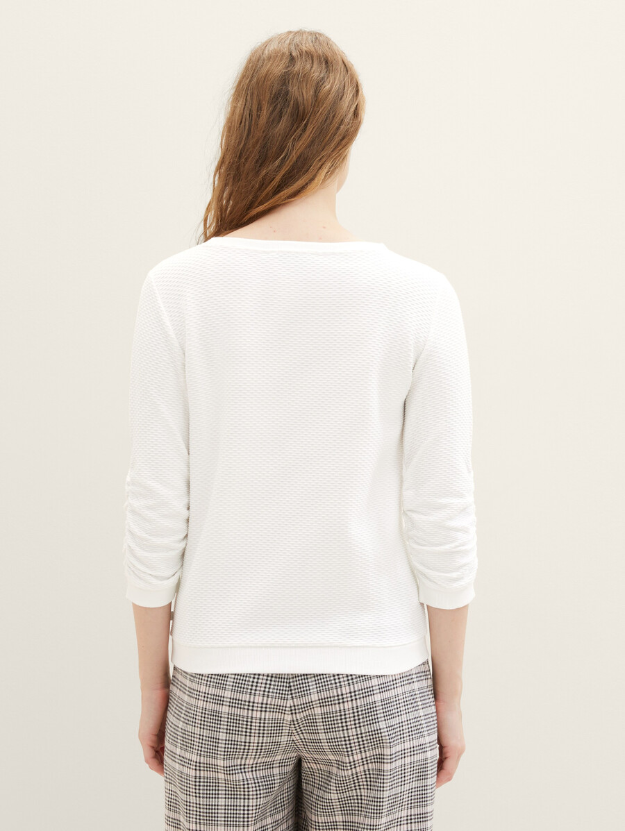 sudadera con volantes