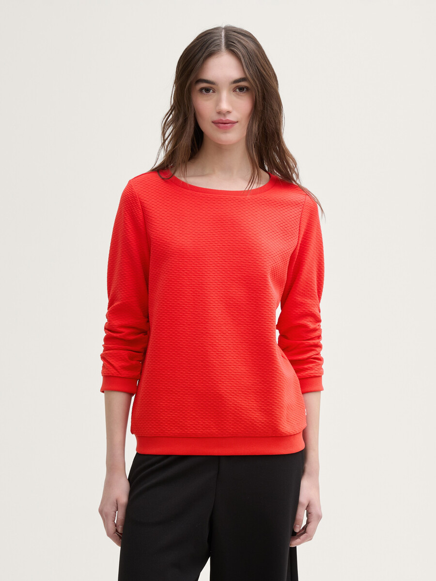 sudadera con volantes