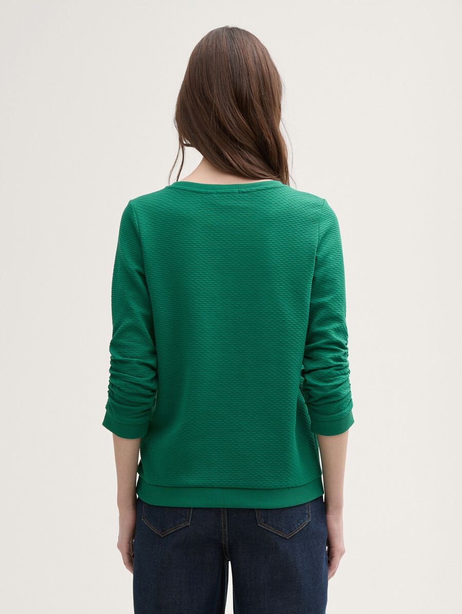sudadera con volantes